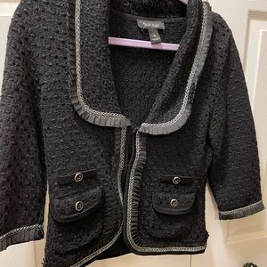 Short , black blazer/jacket.